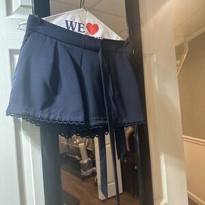 Banana Republic Navy blue pleated short with a tie waist.